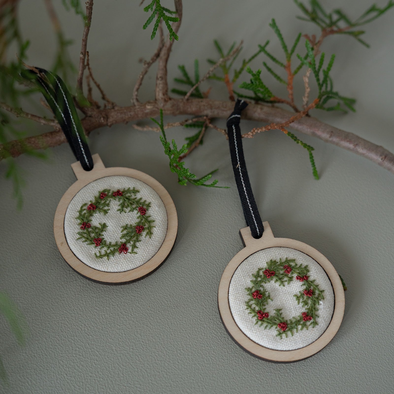 Hand embroidered holiday ornament