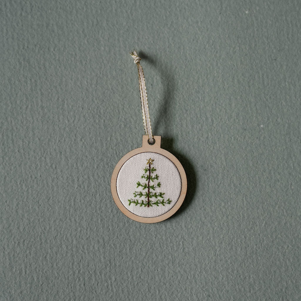 Hand embroidered holiday ornament