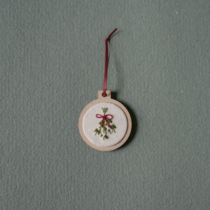 Hand embroidered holiday ornament